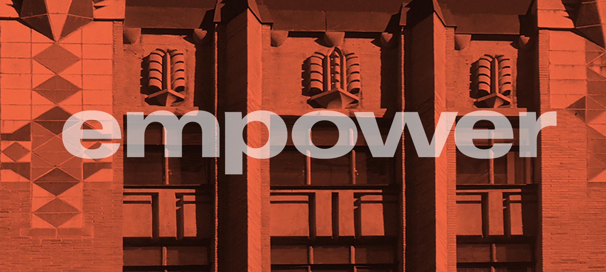 Text that reads ‘empower' on orange-tinted photo of Art Deco building detail.